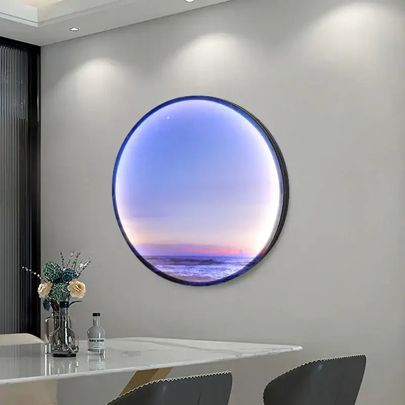 Circular ring sky blue wall lamp featuring glowing blue and pink sunset over ocean waves in sleek black frame for bedroom