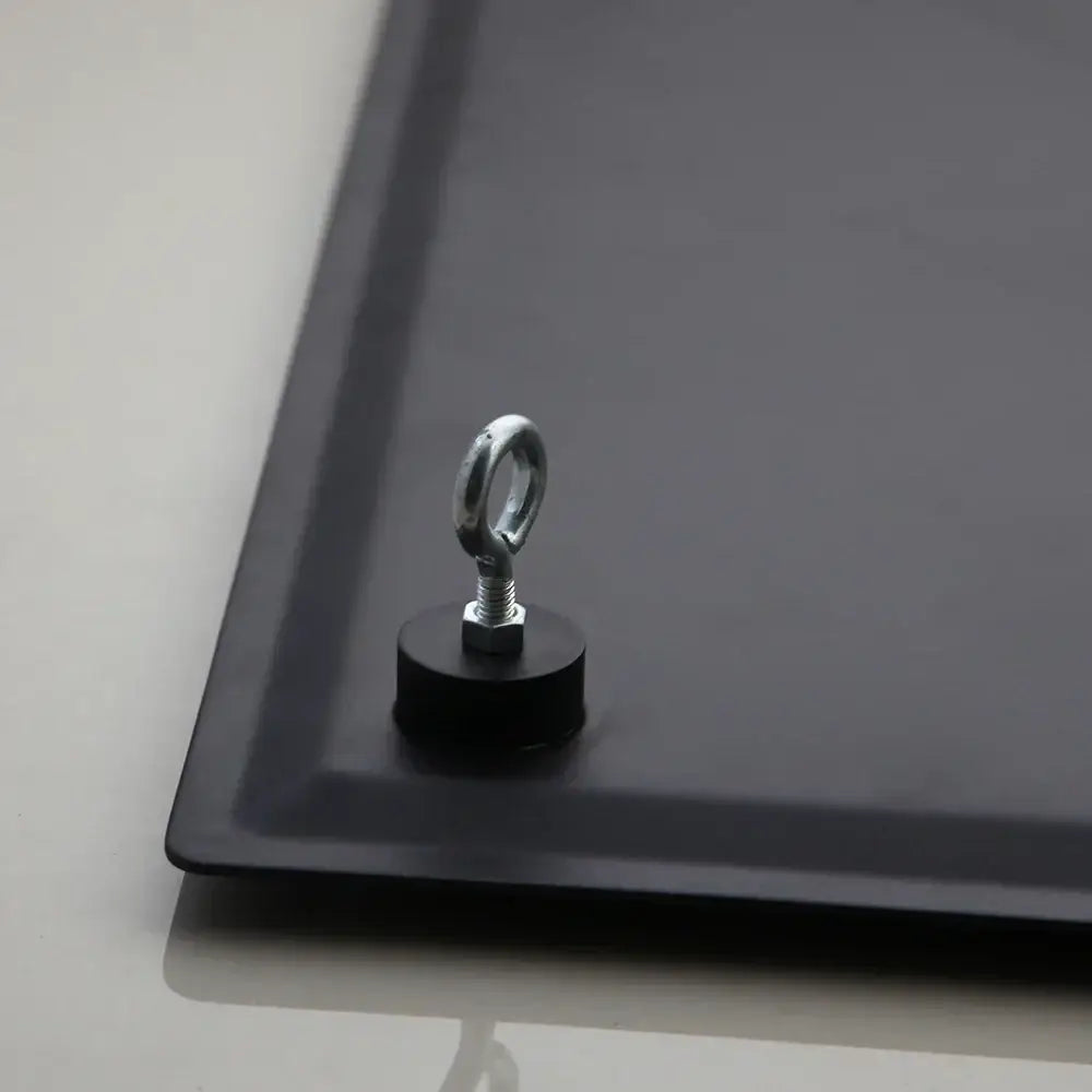 Black magnetic mounting plate with silver eye bolt and hex nut assembly for super slim matte black shower head back side