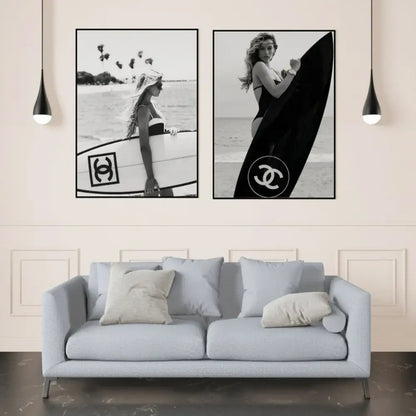 Black and white framed surfboard wall art featuring women with chanel logos for teen room decor by DecorBites