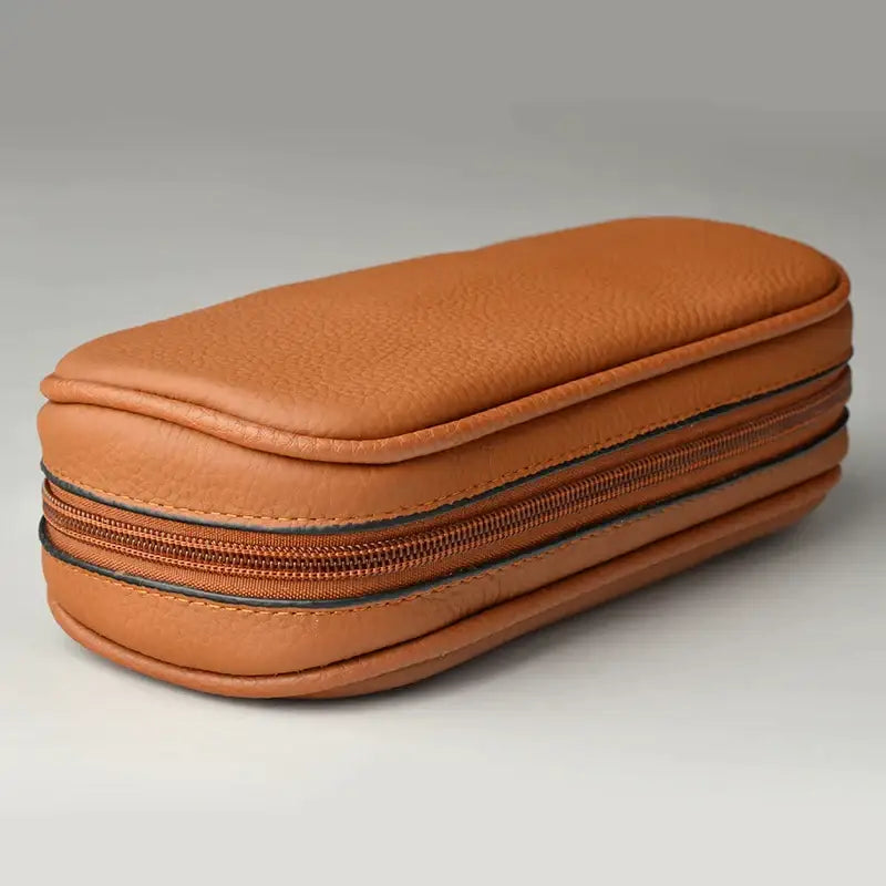 Tan cowhide leather pipe case with textured surface and dual zippers for office storage by decorbites cowhide leather
