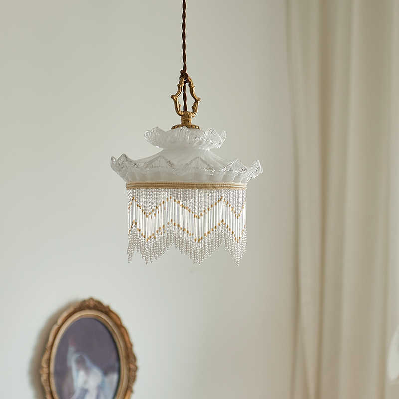 Vintage-style tassel chandelier with glass beads and brass frame ideal for dining room bedside and hallway lighting