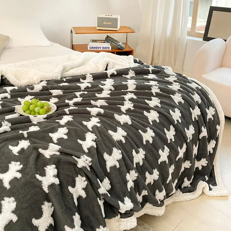 Cozy dark gray wool blanket with plush white puppy pattern and soft sherpa lining featuring decorbites butterfly jacquard