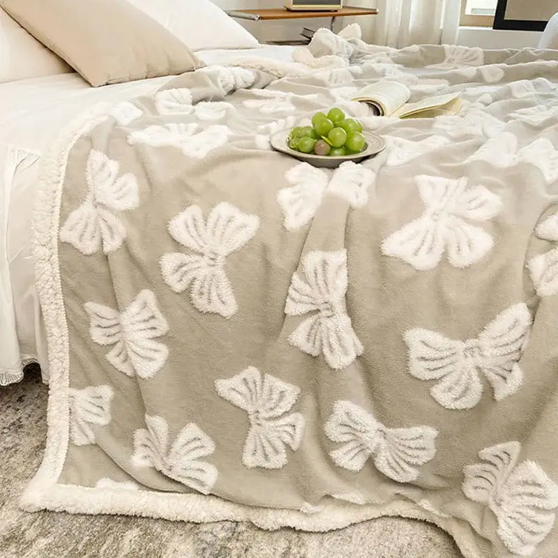 Taupe and white butterfly jacquard wool blanket with beige plush throw and soft fuzzy texture for cozy decorbites decor