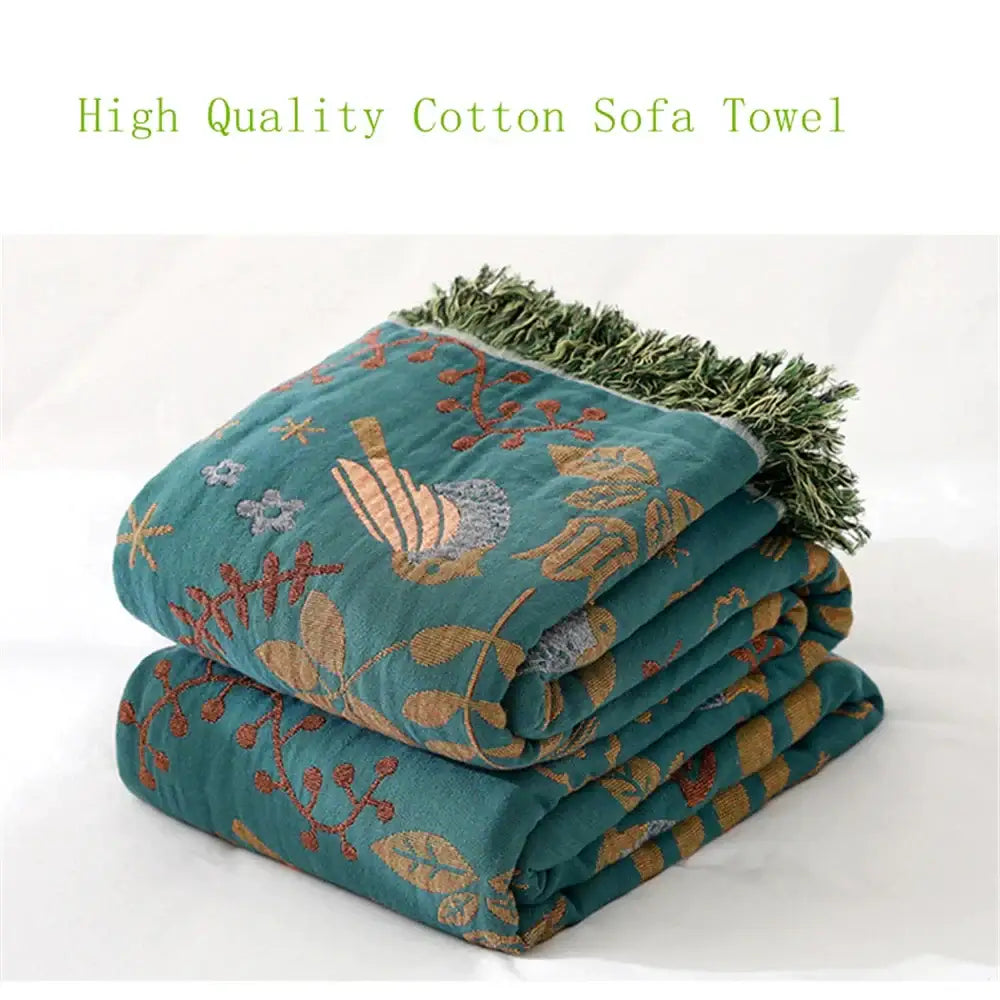 Teal and gold embroidered bird non-slip sofa blanket in decorbites cotton gauze with green fringe for living room decor