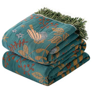 Teal and gold embroidered bird non-slip sofa blanket with decorbites cotton gauze and green fringe for living room decor