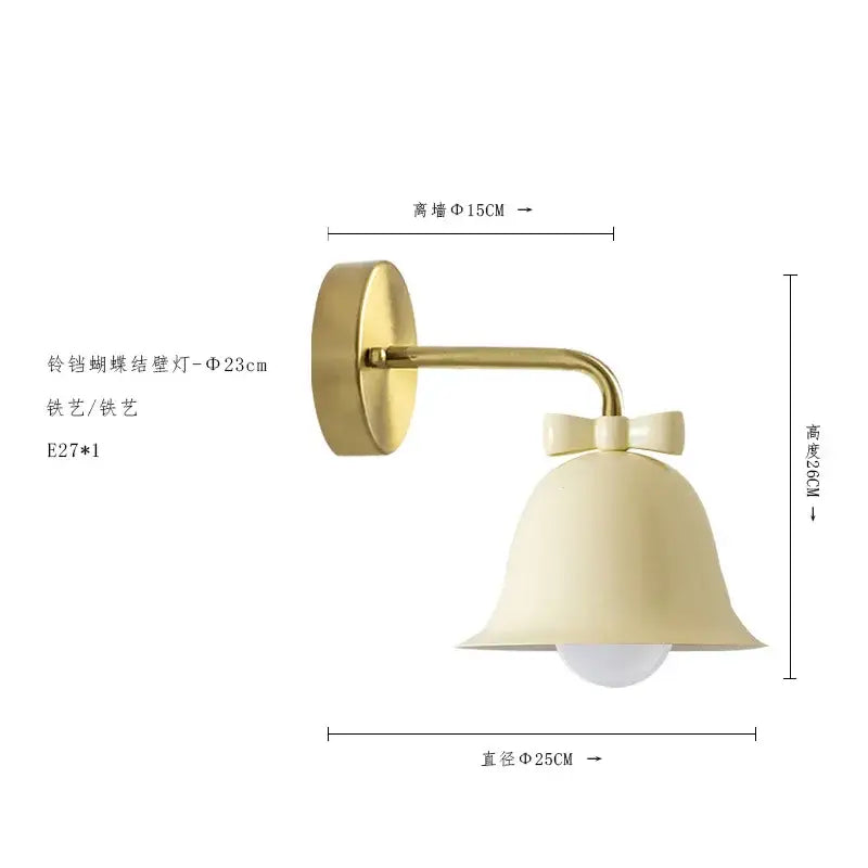 Cream-colored decorbites bowknot bell wall lamp with gold metal arm and elegant bow detail for bedroom decor