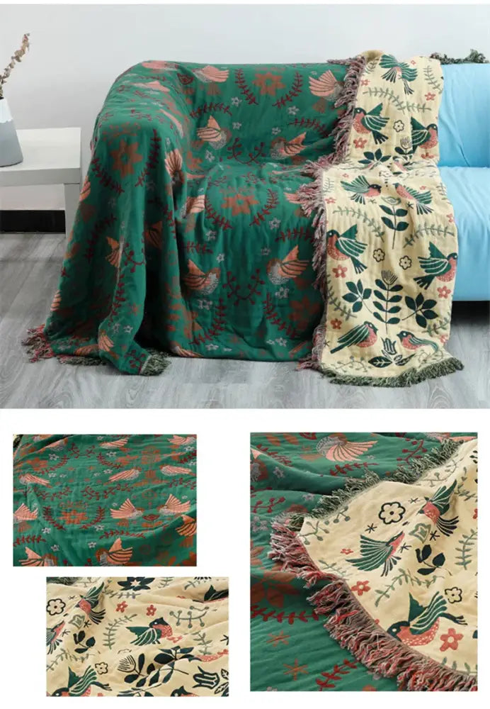 A cozy two-toned birds jacquard cotton sofa cover with floral pattern in earthy teal and cream for living room decor