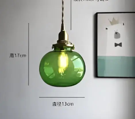 Teal blue glass pendant light with brass hardware featuring decorbites blue glass pendant design for dining room decor