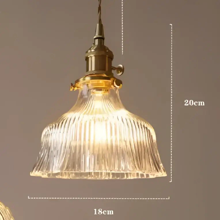 Teal blue glass pendant light with brass hardware featuring clear ribbed glass and vintage-style pendant lights decorbites blue glass