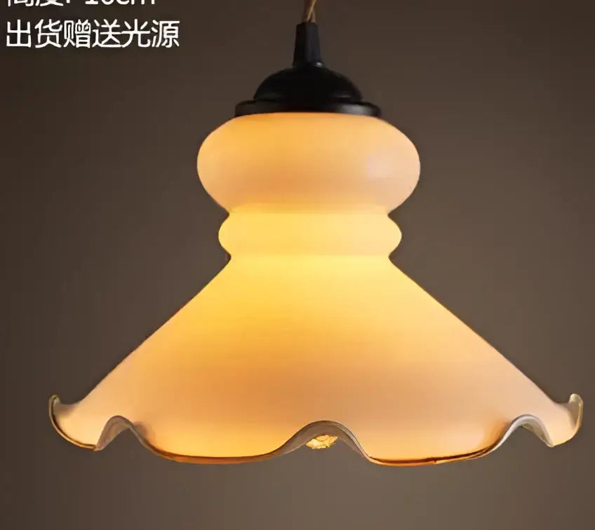 Warm-toned frosted glass pendant light with scalloped edge and black metal top for dining room decorbites blue glass pendant lights