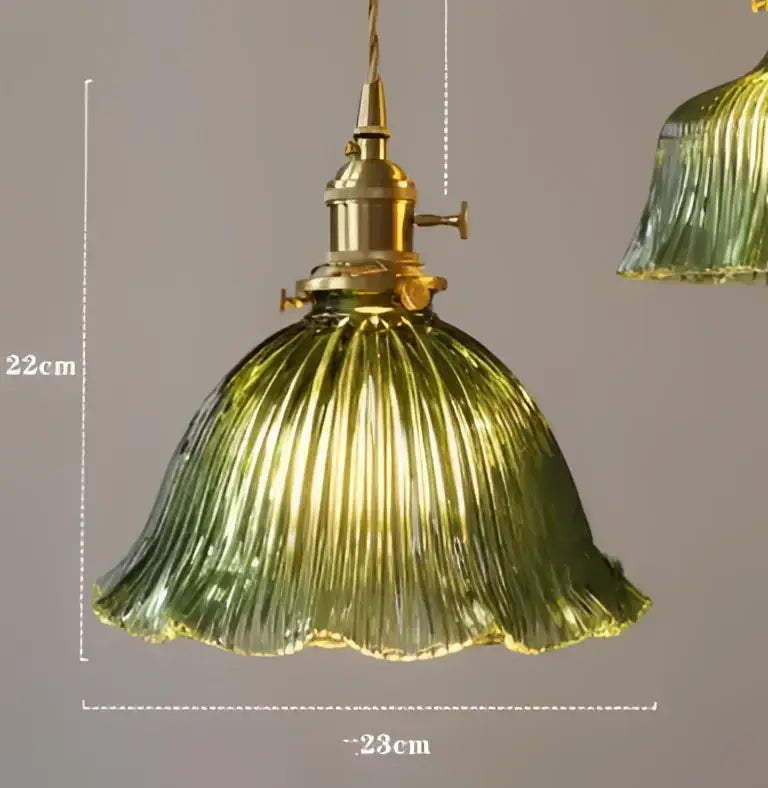 Teal blue glass pendant light with ribbed texture and brass hardware ideal for dining room pendant lights decorbites blue glass