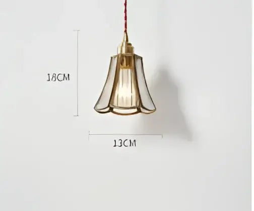 Teal blue glass pendant light with brass hardware and fluted glass shade featuring exposed filament bulb for dining room decorbites blue glass pendant lights