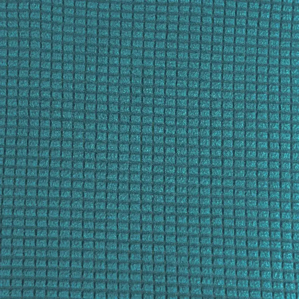 Teal blue quilted chair cover with textured grid pattern stretch elastic fabric for dining room decorbites use