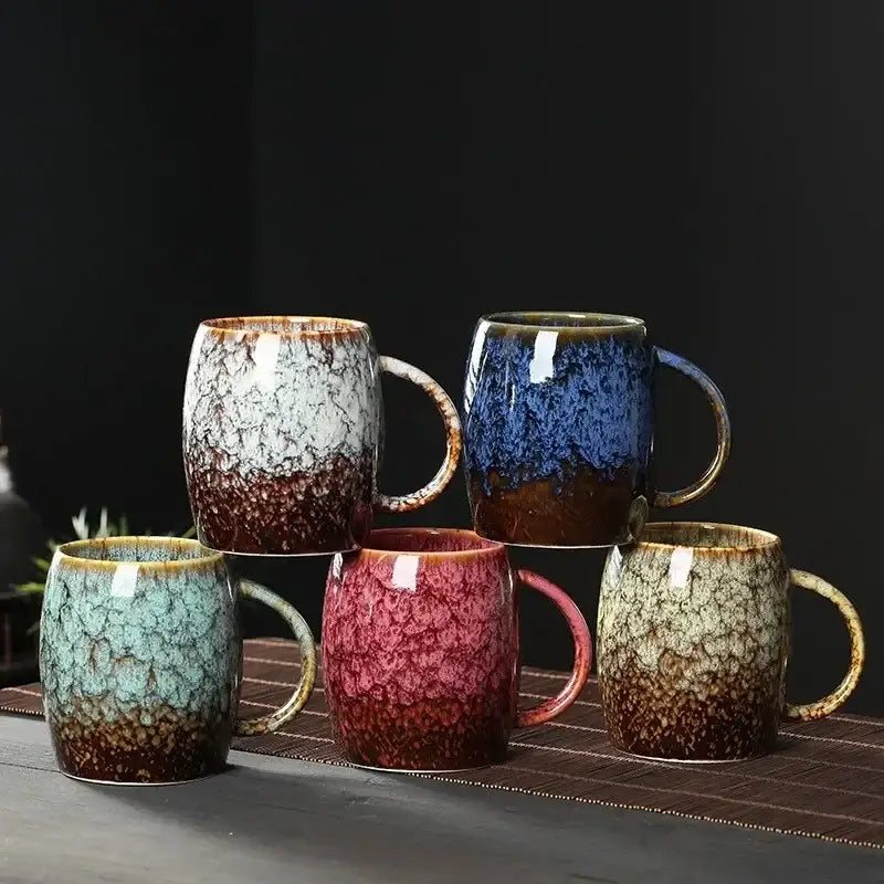 Five handcrafted teal and brown crackle glaze 480ml ceramic mugs in gradient colors for kitchen and coffee use