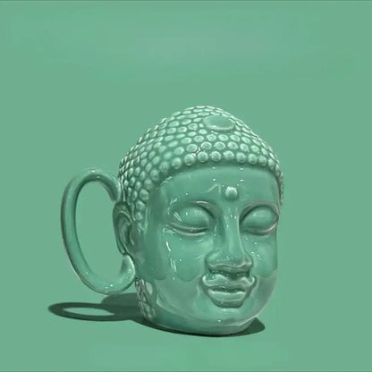 Teal buddha sculpture ceramic coffee mug with glazed turquoise finish and detailed dot patterns for decorbites buddha sculpture decor