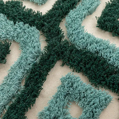Textured teal and dark green fringe pattern on beige fabric boho tufted pillow covers decorbites boho living room decor