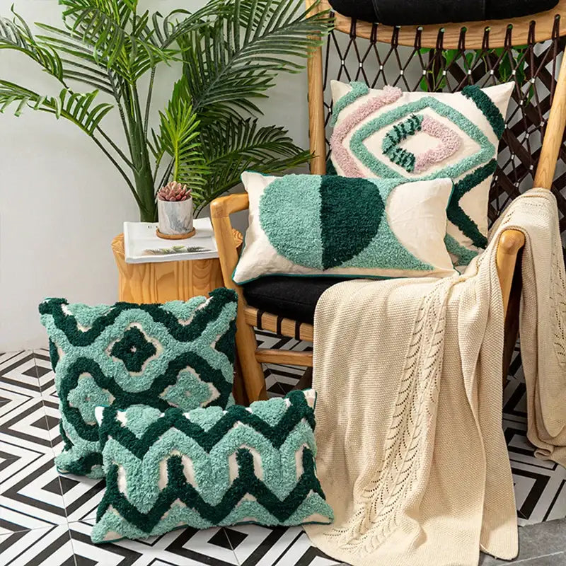 Set of three teal and dark green geometric embroidery tassel cushion cases with cream accents for living room decorbites decor