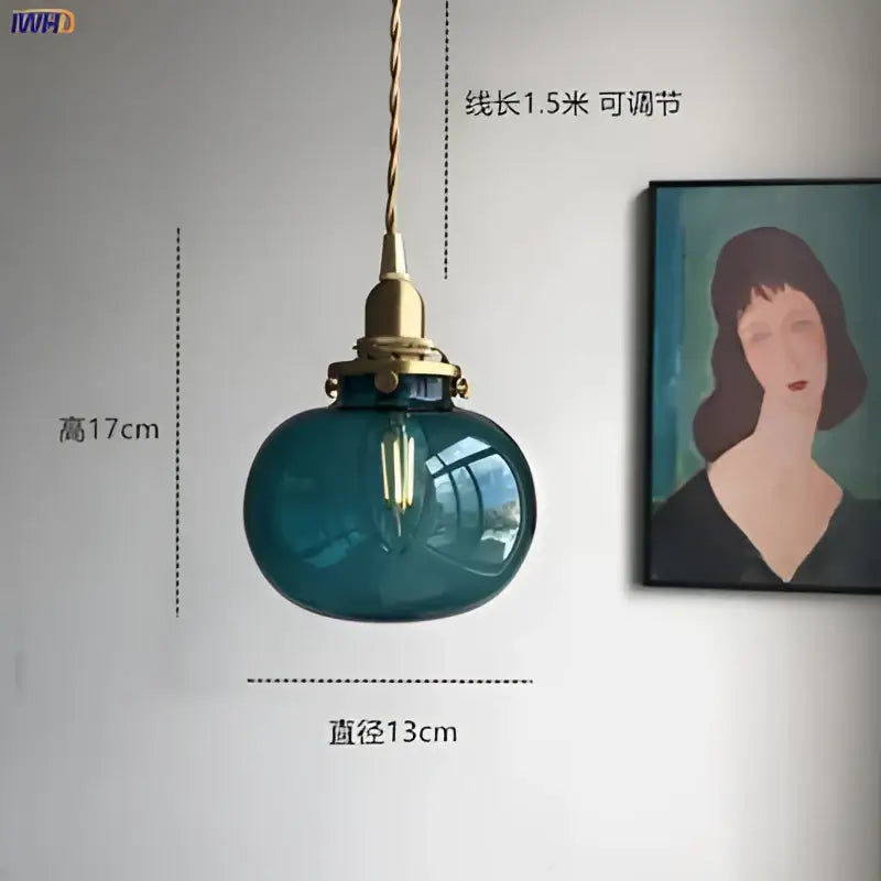 Teal glass ball pendant light with brass hardware and visible filament bulb for bedroom decorbites glass ball pendant