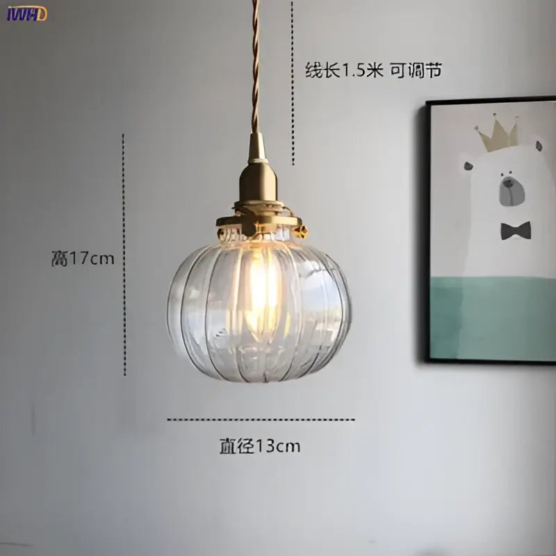 Teal glass ball pendant light with ribbed clear glass, brass hardware, and adjustable 1.5-meter cord for bedroom decorbites
