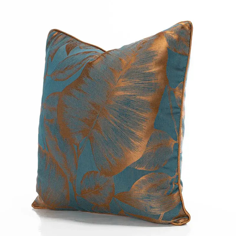 Teal and gold banana tree leaves cushion cover with satin finish and jacquard fabric for living room decor