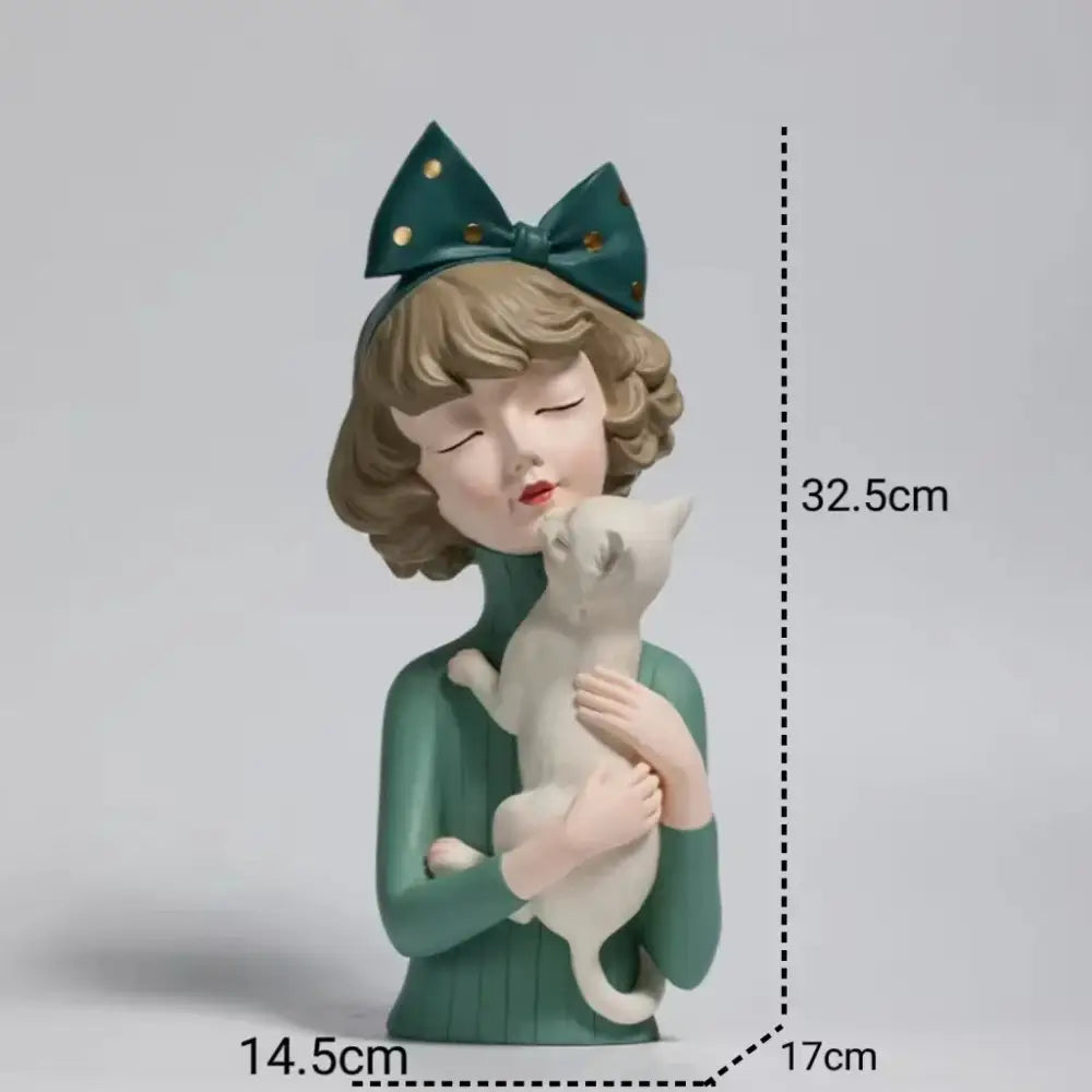 A charming green resin bowknot cat girl figurine with a teal and gold bow holding a white kitten for living room decor