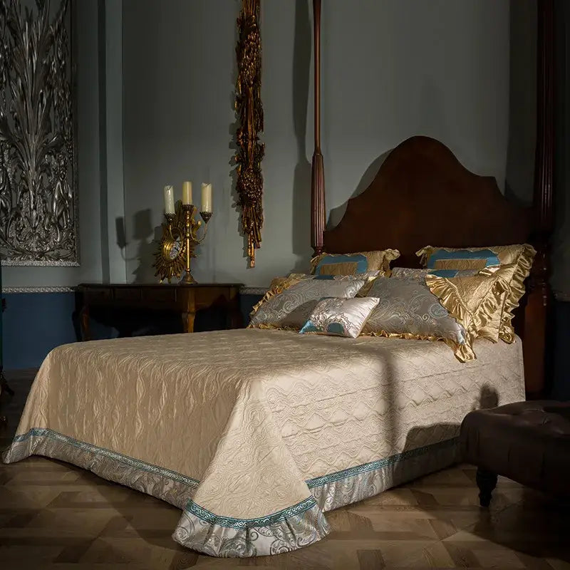 Cream-colored quilted bedding set with gold and teal decorative trim made of 200s Egyptian cotton for bedroom use