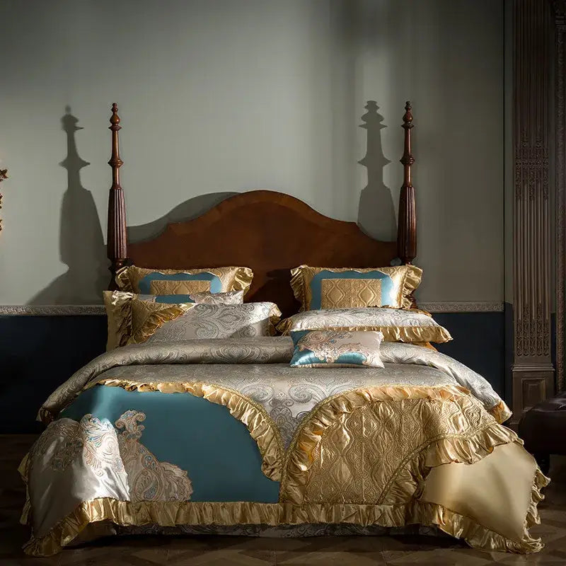 Luxurious teal and gold embroidered bedding set with ruffled satin edges made from 200s egyptian cotton