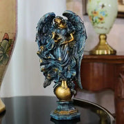 Detailed teal and gold prayer angel goddess statue with outstretched wings on ornate base for greek mythology decor