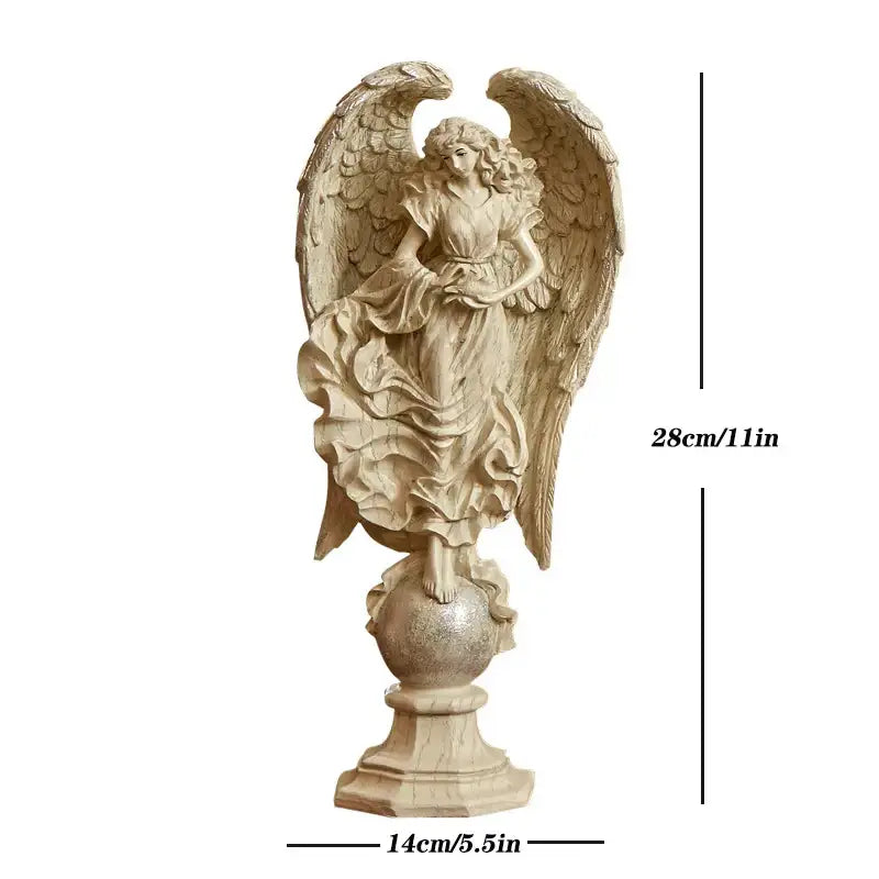 Beige prayer angel goddess statue with detailed wings and flowing robes on decorative globe base for greek mythology decor
