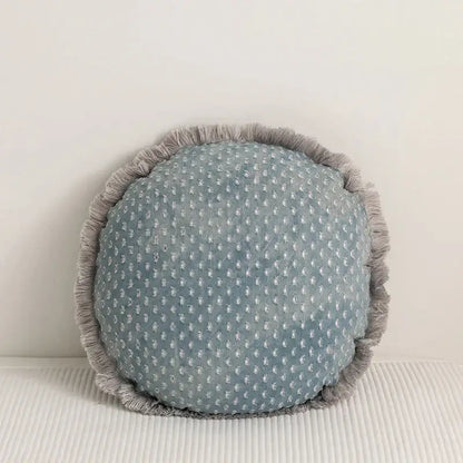 Teal and gray denim fringed cushion cover with light blue fabric, white dot pattern, and textured gray fringe for living room decor