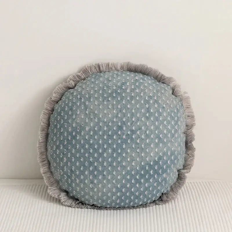 Teal and gray denim fringed cushion cover with light blue fabric, white dot pattern, and textured gray fringe for living room decor