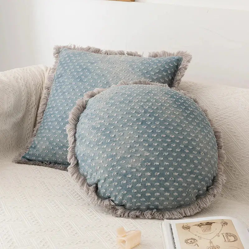Teal and gray denim fringed cushion cover with soft light blue textured fabric and gray fringe trim for living room decorbites decor