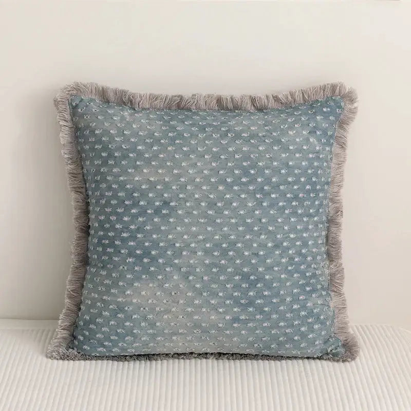 Teal and gray denim fringed cushion cover with soft blue fabric and white floral embroidery for living room decorbites decor