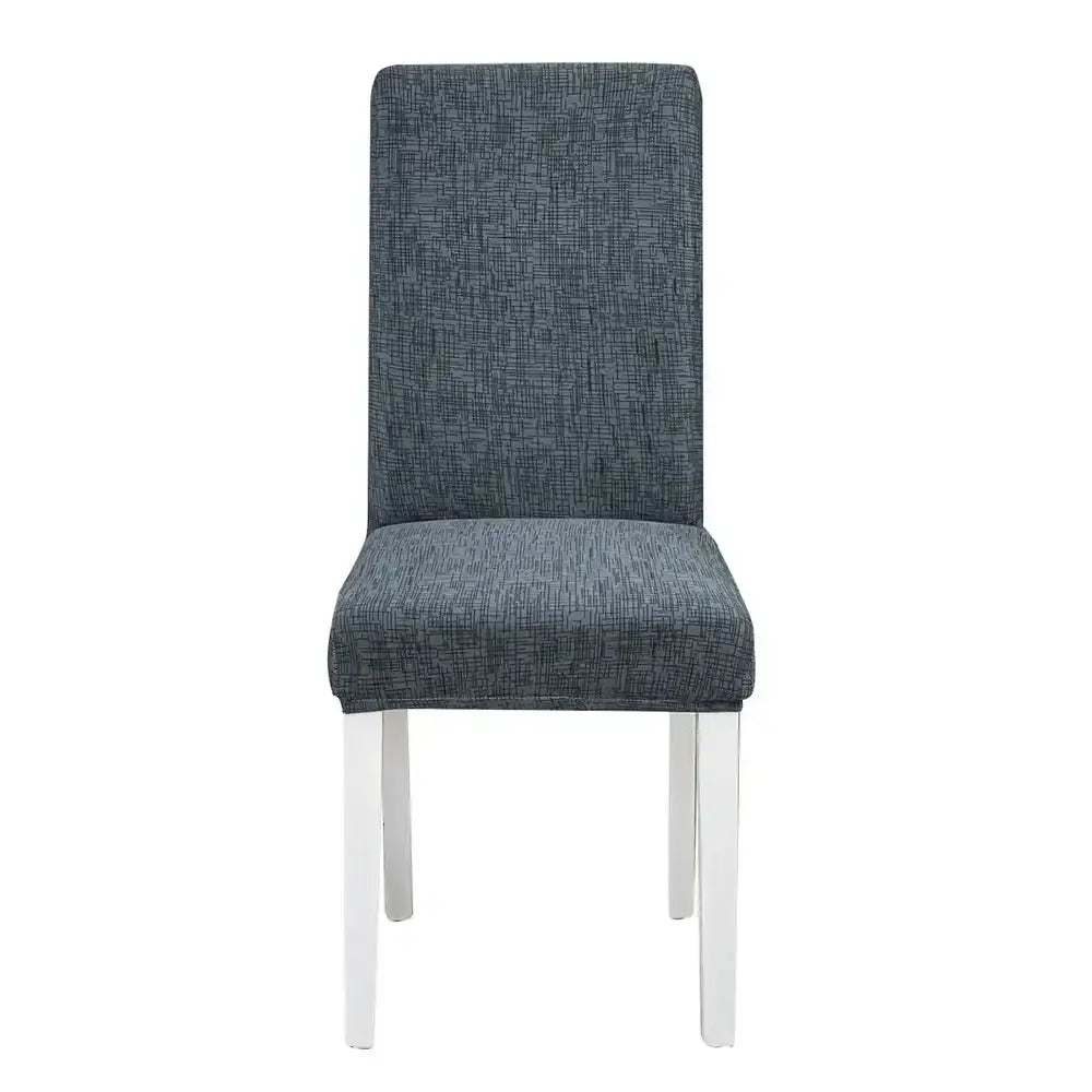 Modern dining chair with dark gray textured fabric and white legs featuring decorbites geometric stretch chair cover