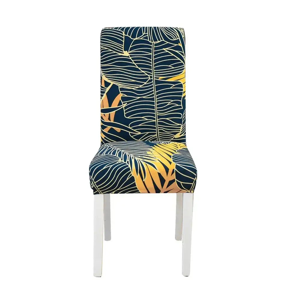 Teal and gray geometric stretch chair cover with navy blue and yellow tropical leaf pattern on white legs for dining room decorbites geometric stretch