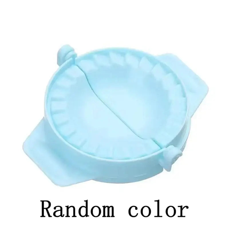 Light blue silicone dumpling skin maker with fluted edge and handles for dough press tool use in kitchen