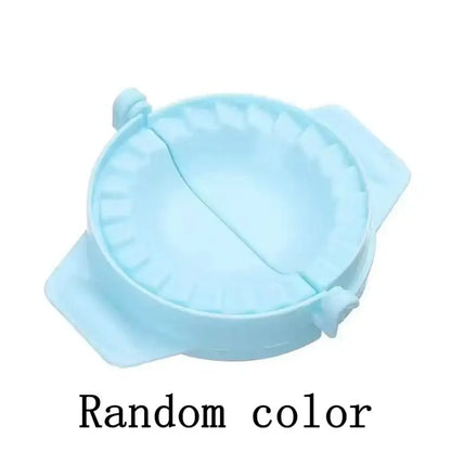 Light blue silicone dough press tool with fluted edge and handles for making dumpling skin and dumpling skin maker use