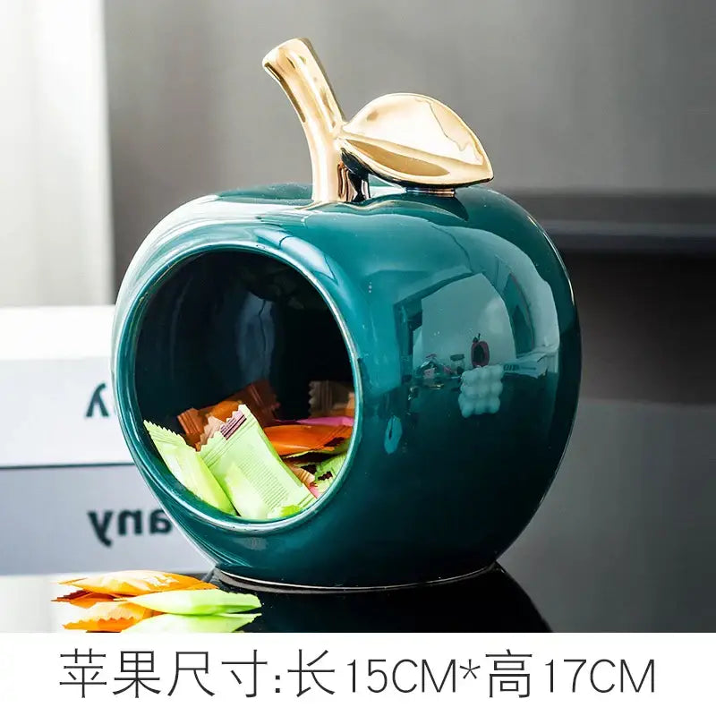 Teal ceramic apple storage box with gold toned stem and leaf lid ideal for living room storage box use