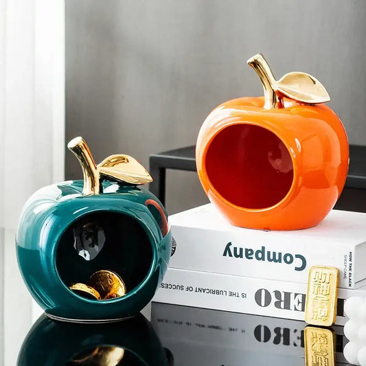 Glossy teal and orange ceramic apple storage boxes with gold plated stems and leaves for living room storage box use