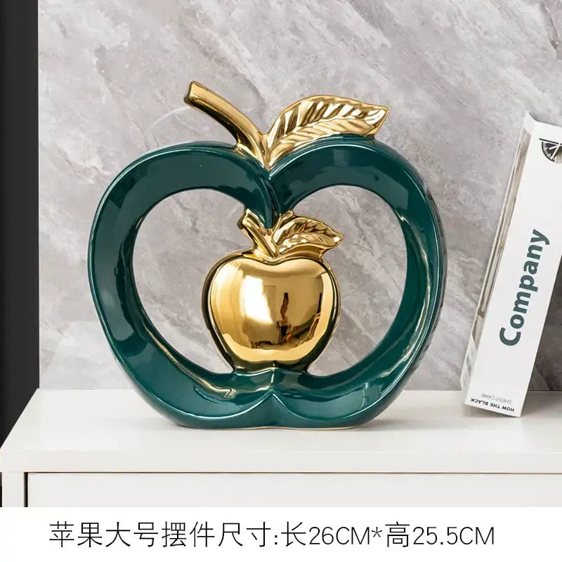 Teal and orange gold plated ceramic apple storage box with glossy finish and polished gold accents for living room