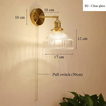 Vintage-style brass wall lamp with teal ribbed glass shade led and adjustable pull chain for luxury living room decor