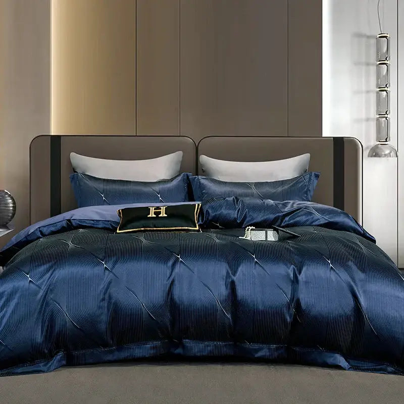 Deep navy satin duvet cover with ribbed texture and gold embroidery pillow sham in 1000tc egyptian cotton bedding set