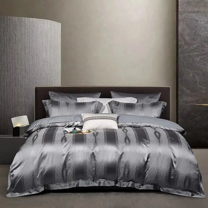Luxury gray satin duvet cover set with subtle feather pattern and matching pillowcases in 1000tc egyptian cotton bedding set