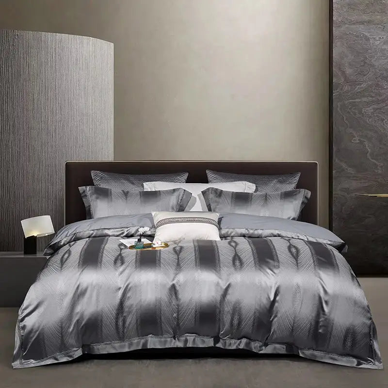 Luxury gray satin duvet cover set with subtle feather pattern and matching pillowcases in 1000tc egyptian cotton bedding set