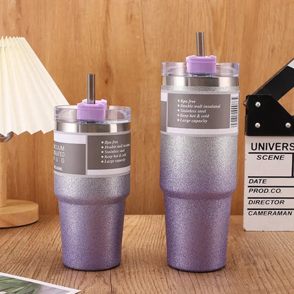 Two glittery purple decorbites coffee cup thermos tumblers with stainless steel and lavender sip straws for insulated use