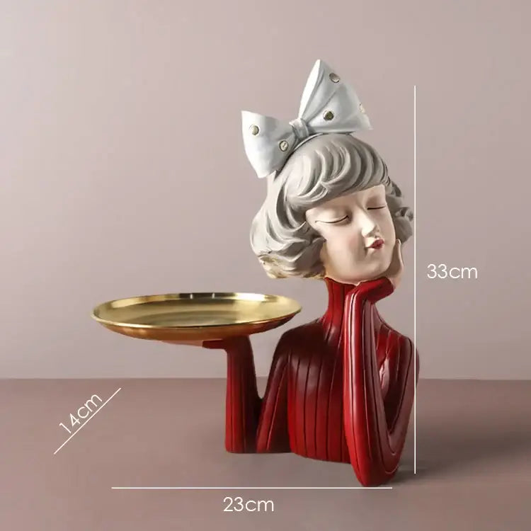 A glossy red and silver bowknot girl resin figurine holding a gold tray for decorbites bedroom decor