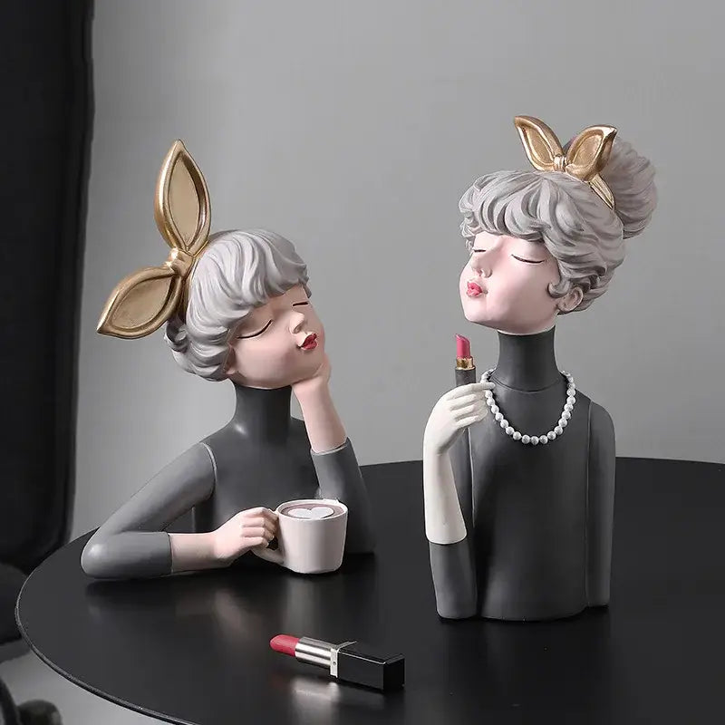 Two stylized resin bowknot girl figurines with silver gray hair and gold bows for decorbites bowknot girl decor