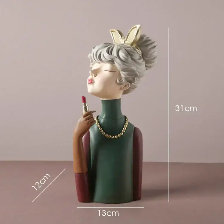 A resin bowknot girl figurine with silver hair, green turtleneck, and gold accessories for bedroom decorbites decor