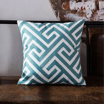 Teal and white geometric embroidered cushion cover with textured fabric finish for living room decorbites blue geometric style