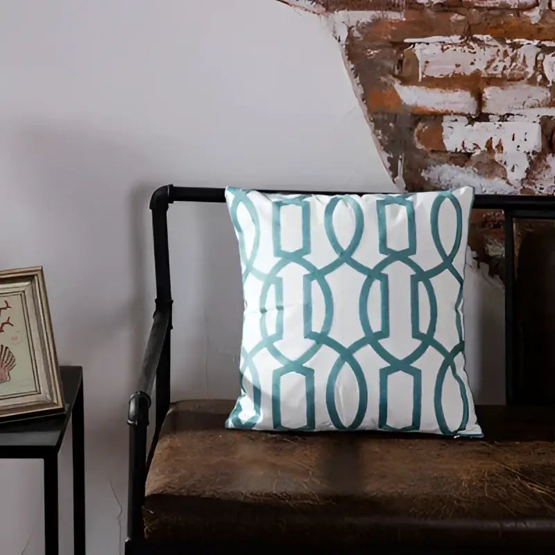 White throw pillow with teal blue geometric embroidered pattern cushion cover in smooth fabric for living room decorbites decor